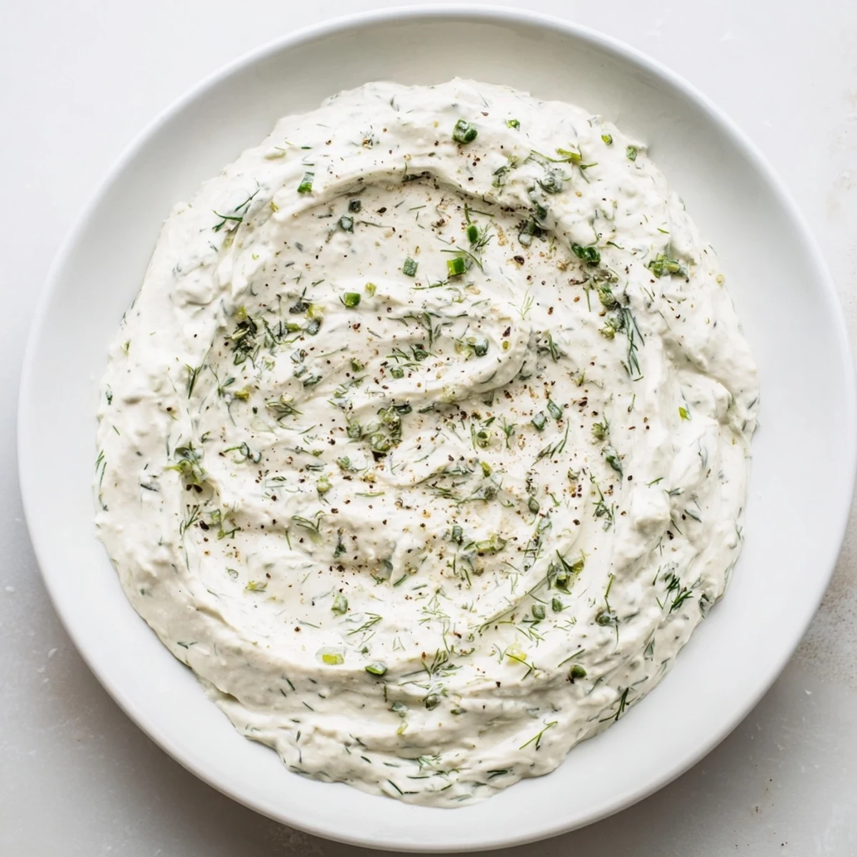 Greek Yogurt Ranch Dip: A creamy, herb-flecked bowl of ranch dip, perfect for dipping veggies.