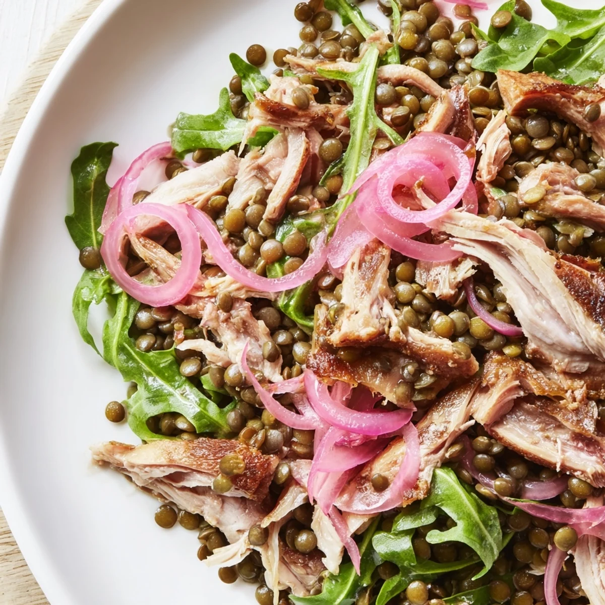 Vibrant Lentil & Chicken Spring Salad with peppery arugula, tangy pickled onions, and tender lentils, tossed in a zesty mustard dressing.