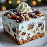 Slices of Christmas Cheesecake Slab reveal creamy spiced filling and a crunchy biscuit crust, ready for holiday dessert lovers. 