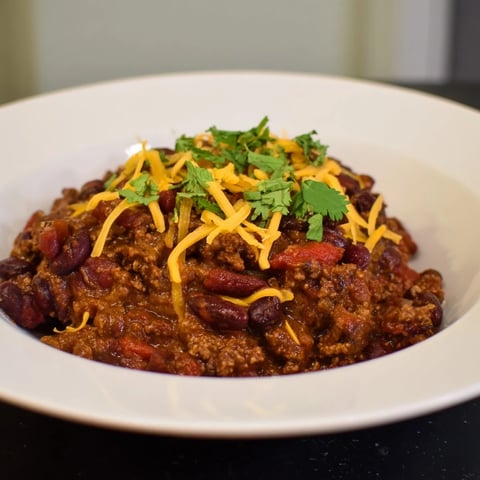 Steaming One-Pot Cozy Chocolate Chili, with a dark, rich broth, ready to warm your kitchen.