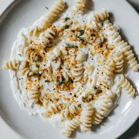 Creamy Turkish Yogurt Pasta, with fusilli pasta coated in garlicky yogurt and spiced butter.