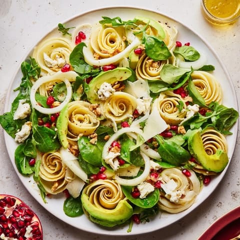 Vivid image of the Fibonacci Fan Salad, showcasing the spiral's texture of leafy greens and ripe tomatoes.