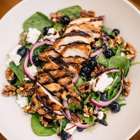 This mouthwatering Blueberry Goat Cheese Chicken Salad features juicy blueberries alongside tender chicken and tangy balsamic.