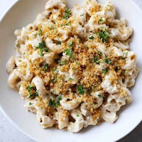 Golden, bubbly high-protein mac & cheese, perfect for a cozy, comforting, satisfying dinner.