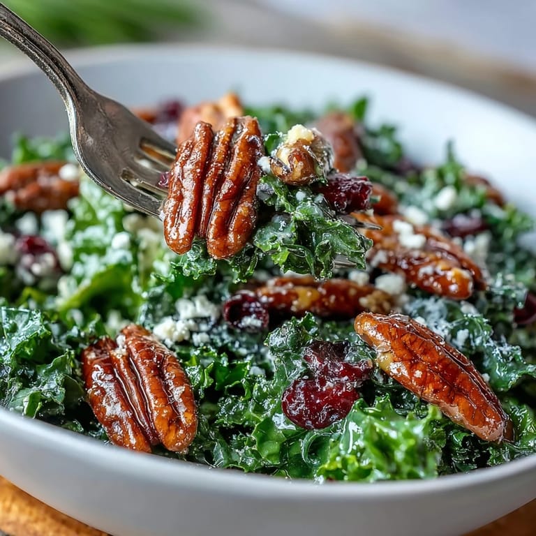 Close-up of warm kale salad with maple mustard dressing, perfect for a healthy side.